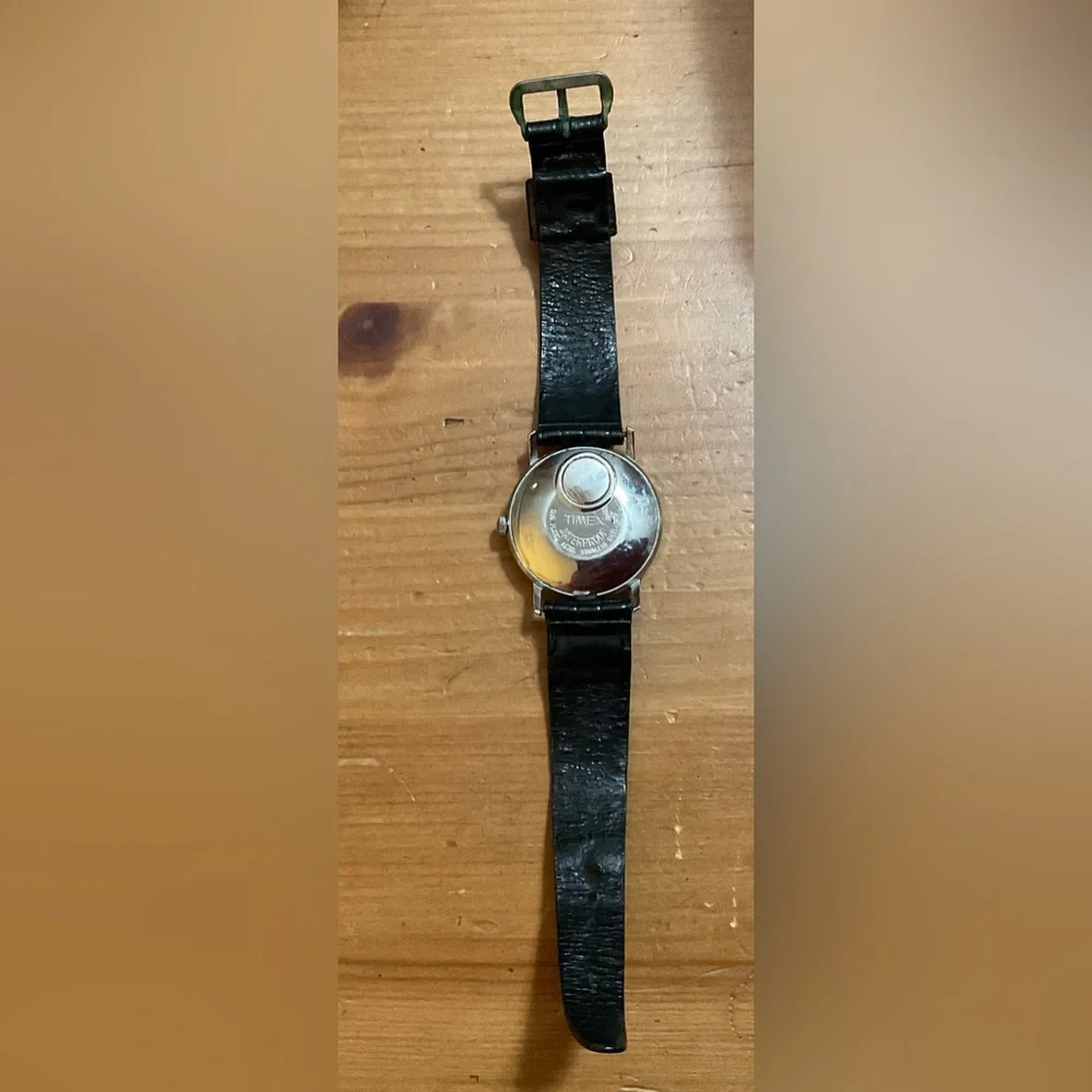 Timex: Men’s vintage (rare find) electromechanical wrist watch black wrist band.